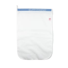 Guppyfriend washing bag, a translucent white fine-mesh laundry bag with a blue GUPPYFRIEND zip-top band