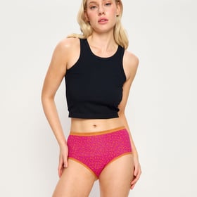 Modibodi Classic Full Brief period underwear, polka dot pattern, front view on neutral background