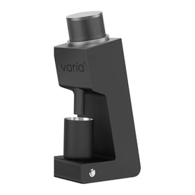 Varia VS3 single-dose electric coffee grinder in black, with its metal dosing cup docked beneath the chute