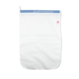 Guppyfriend washing bag, a translucent white fine-mesh laundry bag with a blue GUPPYFRIEND zip-top band