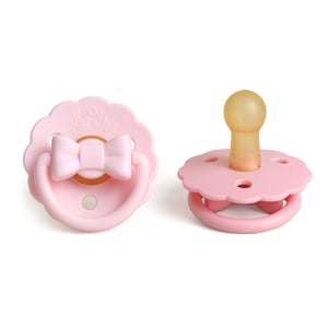 Itzy Ritzy natural rubber pacifier in pink, front and back views