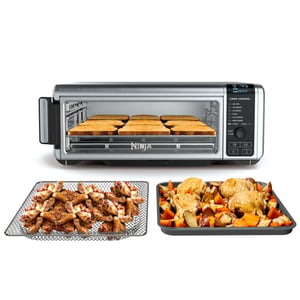 Ninja Foodi SP101 8-in-1 digital air fry flip oven with air-fry basket and sheet-pan accessories on white background