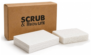 Scrub & Throw Lite natural cellulose sponges, a stack of flat compressed white pads and one expanded wet sponge beside a cardboard box