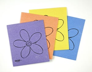 Skoy Cloth reusable Swedish dishcloths, four colored cellulose-cotton cloths with flower design fanned out