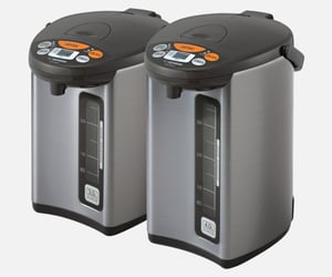 Zojirushi Micom Water Boiler & Warmer (CD-WCC) in silver, a tabletop hot-water dispenser with a dispensing spout